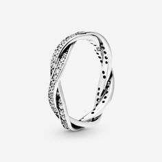 Show that style is forever with this sterling silver ring. Made from sterling silver, one of our three signature metals, the glittering band ring is made from twisted lines of pavé-set cubic zirconia. Reminiscent of an infinity symbol, it can be worn for just about any occasion – and also to symbolize a bond of love. Try stacking multiples together for a special occasion. - Pandora Sparkling Twisted Lines Ring - Sterling silver / Cubic Zirconia / Clear - Sz. 5 Pandora Stackable Rings, Pandora Rings, Bagan, Pave Ring, Engagement Jewelry, Pandora Jewelry, Perfect Ring, Stackable Rings, Sterling Ring