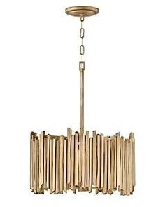 a chandelier made out of wood sticks and hanging from a ceiling light fixture