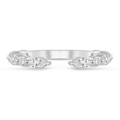 a white gold ring with three diamonds