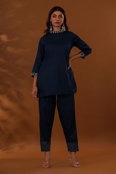 Navy blue top with placed thread embroidered floral patterns. Comes with matching pant. - Aza Fashions Fitted Blue Pant Set With Resham Embroidery, Fitted Blue Embroidered Pant Set, Traditional Cotton Pant Set For Work, Pant Women, Navy Blue Top, Pant Sets, Band Collar, Blue Top, Embroidered Silk