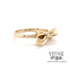 An estate 14 karat yellow gold small bow ribbon design ring. The ring is finger size 3.75. Bow Ribbon, Ribbon Design, Small Bows, Ribbon Bow, The Ring, Ribbon Bows, Rose Gold Ring, Ring Designs, Gold Ring