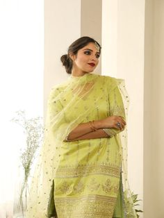 Beautiful Kurta set made in cotton silk. It has glorious golden embroidery all over paired with handcrafted organza dupatta. Color: Pistachio Green Fabric: Cotton Silk and Organza Note: Length and sizes can be customised Length - Kurta 40 inches Pants 38 inches Available in other colors If you happen to see some deformity in hand-work or fabric, that’s mere the technique of the same and not a defect. The garment is quite premium. The product will be delivered within 20-25 days of order placed Wa Silk Kurta Set, Golden Embroidery, Silk Kurta, Pistachio Green, Organza Dupatta, Hand Work, Kurta Set, Green Fabric, Cotton Silk