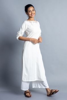 "White Embroidered Indian Kurti, Linen Maxi Top, Shift Tunic, Plus Size, Custom Made, Made to Order Customizable Indian Tunic Kurti -Model height: 5'3\" wearing size S -Length: 44\" -Elasticated sleeve" White Embroidered Straight Kurta Top, White Cotton Tunic Kurta, White Cotton Kurta In Tunic Style, White Cotton Sets With Embroidered Hem, White Straight Kurta Tunic, Cotton Sets With Embroidered Neckline Straight Kurta, Festive White Kurta With Embroidered Neckline, White Long Sleeve Kurta With Embroidered Neckline, White Cotton Tunic With Resham Embroidery