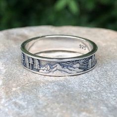 "Sterling Silver Sun with Mountains and Trees Ring The perfect ring for lovers of the outdoors and nature.  Ring Band measures just over 3/16\" H" Gifts For Nature Lovers Men, Rock Climbing Jewelry, Guys Rings Aesthetic, Granola Rings, Men’s Jewlery Silver, Men’s Silver Rings, Men With Rings, Male Jewelry Aesthetic, Men’s Accessories