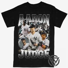 a black t - shirt with an image of baseball players