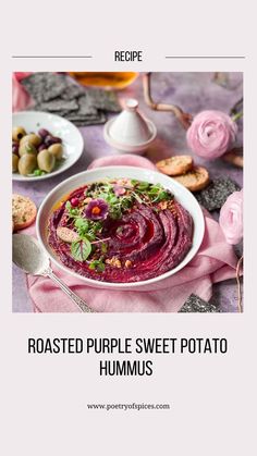 the recipe for roasted purple sweet potato hummuss is shown on a table with pink flowers