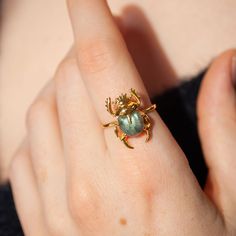 This beautiful ring is made in Sterling Silver and coated with a thick layer of 24K Yellow Gold to a Gold Vermeil thickness and set with a natural Labradorite. 24K Gold Vermeil jewelry is not only hypoallergenic, but it also does not tarnish.  Your ring is meticulously handcrafted and hand-polished to perfection. It is made to last a lifetime with proper care. This is a unique piece of minimalist jewelry for everyday wear.  Please note: Due to the one-of-a-kind nature of the gemstone, exact colo