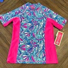 Nwt Lilly Pulitzer Girls Rash Guard Size Large( 10/12) Beautiful Pink , White And Blue Upf 50 Sun Protection Part Of The Lilly For Target Collection Target Swim, Lilly Pulitzer Target, Fan Dance, Sun Shirt, Swim Shirts, Flamingo Print, Printed Swim, Kids Swimming, Rash Guard