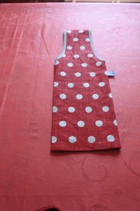 a red table with white polka dots on it