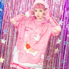 Step into the world of Care Bears with this super cute loose shirt! It features a vibrant and kawaii print of Love-a-Lot the pink bear. This shirt is perfect for adding a pop of color to your outfit! Made of polyester fabric Shoulder width: Approx. 53 cm Chest circumference: Approx. 122 cm Sleeve length: Approx. 28 cm Length: Approx. 71 cm Acdc Rag, Pink Bear, Travel Umbrella, Loose Shirt, Skirt Socks, Loose Shirts, Care Bears, Beauty Bag, Handbag Backpack