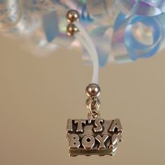 Only one left! This flexible maternity belly button ring has a silver "It's A Boy!" charm attached to a flexible and comfortable PTFE bar. Pick your length, and if needed, can easily be shortened for a perfect and comfortable fit. Instructions are shown.  It comes with a 5mm steel ball on top.  Charms are lead free pewter and made in the USA. Hypoallergenic Silver Belly Rings For Gift, Hypoallergenic Silver Belly Rings As Gift, Adjustable Hypoallergenic Silver Belly Rings, Pregnancy Belly, Its A Boy, Navel Ring, Belly Button Ring, Button Ring, Navel Rings