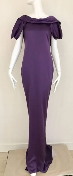 For Sale on 1stdibs - Stunning Alexander McQueen Purple violet silk charmeuse gown with interesting sleeves and exposed bare back. Slightly cowl neck. strap can be removed. Purple Bias Cut Dress For Evening, Evening Slip Dress With Bias Cut And Stretch, Formal Fitted Purple Slip Dress, Fitted Silk Evening Dress With Side Slits, Evening Sheath Maxi Dress With Bias Cut, Evening Sheath Maxi Dress In Bias Cut, Stretch Evening Slip Dress, Fitted Silk Gown With Cowl Back, Elegant Stretch Bias Cut Slip Dress