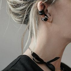 The Rannka adjustable earring leather cuff is a versatile unisex accessory featuring black leather and metal wrap. It's the perfect alternative jewelry ear cuff for a friend as a surprise gift.  𝐒𝐈𝐙𝐄: ➤ 100% adjustable Because of its wire construction - it easily bends and wraps to form any shape or size.  𝐃𝐄𝐓𝐀𝐈𝐋𝐒: ➤ Material: Faux Leather, Mixed Metal Nickel Free, Lead-Free & Hypoallergenic, Non-Tarnish ➤ Choose from Two Designs: With and Without Metal Ring ★ Sold as ONE earring ★ ➤ Adjustable Single Metal Wrap Earring, Trendy Black Cartilage Earrings, Trendy Black Metal Cartilage Earrings, Modern Black Cartilage Earrings, Modern Black Pierced Cartilage Earrings, Adjustable Metal Trendy Ear Cuff, Minimalist Metal Ear Cuff For Party, Adjustable Metal Minimalist Cartilage Earrings, Trendy Adjustable Wrap Earrings