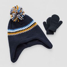 Upgrade your baby boy's cold weather accessories with this set from Capelli of N.Y. It includes a striped pom-pom beanie made from a knit fabric lined with warm fleece and a pair of matching mittens. # Pieces In Set: 2Included: 1 Mittens, 1 Hat(s)Features: LinedWarmth Factor: LightweightFiber Content: 90% Acrylic, 10% PolyesterFabric Description: KnitLining: Fully LinedLining Material: FleeceCare: Tumble Dry, Machine WashCountry of Origin: Imported Kids Mittens Hat Knit Free Pattern, Baby Boy Hat Winter, Winter Hat For Toddler Boy, Infant Winter Hat, Toddler Winter Hat, Pom Beanie, Cold Weather Accessories, Winter Accessories, Kids Boys