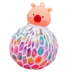 a colorful ball with a bear on it's head sitting in front of a white background