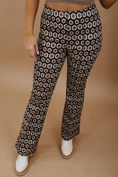 Take me back in time, this 70's inspired pant is featured in a true-to-size fit with a wide-leg style bottom and slimming high-waisted design. Radiate pure retro energy! Waist: High-rise elasticized Fabric: 100% Polyester Wide leg style botto Abstract design throughout Imported Fit: True to size!- Waist: High rise- Leg: Wide - Has some stretchModel Specs: Emily is wearing a size small in the photo.How will this item fit you? Check out our MODEL SPECS(Typical Sizing - Karli: S-Size 5/26 - 5ft 2in, Emily: S-Size 3/25 - 5ft 5in, Syd: L/XL- Size 15/ - 5ft 8in)﻿Need help with sizing? No problem! Join our VIP group on Facebook, Everyday Chic Boutique VIP Insiders to chat directly with our team and other customers just like you.Packaged with love and shipped from our warehouse in Wilmington, Ohio Retro Pants, Take Me Back, Vip Group, Everyday Chic, 70s Inspired, Trend Forecasting, Leather Pieces, Chic Boutique, Back In Time