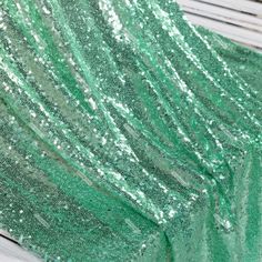 mint metallic sequin fabric for party backdrops Party Backdrops, Decorations Table, Green Sequins, Pageant Dress, Metallic Fabric, Mint Velvet, Glitter Fabric, Sequin Fabric, Backdrops For Parties