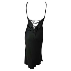 For Sale on 1stDibs - Presenting a gorgeous black satin silk Gucci dress, designed by Tom Ford. From the Fall/Winter 2002 collection, this beautiful mid-length dress features Gucci By Tom Ford, Gucci Dress, Black Leather Dresses, Lace Up Dress, Runway Dresses, Suede Dress, Satin Silk, Mid Length Dresses, Leather Dress