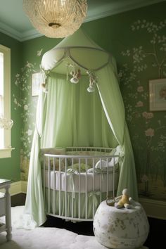 a baby's room with green walls and floral wallpaper, including a crib