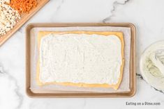 an image of food being made on a tray and ready to be baked in the oven