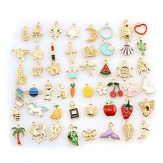 many different types of brooches on a white surface