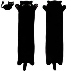 two black cats standing next to each other with their eyes closed and one cat laying on its back