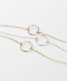 "Dainty Open Circle Bracelet gift, in 14k Gold Fill, Silver or Rose Gold. Beautiful hand-hammered finish. This subtle and dainty bracelet is the perfect gift to give to your loved ones. They'll never stop thanking you. :) D A I N T Y ∙ O P E N ∙ C I R C L E ∙ B R A C E L E T D E T A I L S * 100% 14k Gold Filled, Sterling Silver, or 14k Rose Gold Filled * All raw materials are USA sourced * Open circle charm is 11mm I T ' S ∙ A W E S O M E * Ethically Sourced, USA raw materials * Our lovely packa Minimalist Infinity Bracelet With Adjustable Chain, Minimalist Round Bracelets For Friendship, Dainty Adjustable Circle Bracelets, Adjustable Dainty Circle Bracelets, Minimalist Infinity Jewelry For Friendship, Minimalist Infinity Bracelets For Gifts, Minimalist Infinity Bracelets As Gift, Minimalist Infinity Bracelet As A Gift, Dainty Infinity Bracelets For Friendship