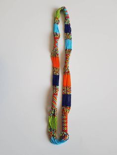 This necklace is 100% handcrafted using colorful fine beads. The necklace makes a perfect gift to loved ones. **Buy multiple items and pay shipping for 1 item only.The rest ships free. Custom orders are welcome. More neckleces here; https://www.etsy.com/shop/TribalTess?ref=seller-platform-mcnav&section_id=21306083 Back to my shop; https://www.etsy.com/shop/TribalTess?ref=seller-platform-mcnav Multicolor Large Beads Multi-strand Necklace, Multicolor Large Beads Long Necklace, Multicolor Polished Beads For Gift, Multicolor Large Beads Multi-strand, Multicolor Large Multi-strand Beads, Colorful Multi-strand Beaded Necklaces, Multicolor Multi-strand Beaded Necklaces, Handmade Multicolor Multi-strand Beads, Handmade Multicolor Beaded Necklaces With Round Beads