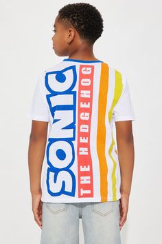 Available In White. Screen Top Short Sleeve Sonic Graphic T-Shirt Front/Back Disclaimer: Due To The Printing Process A Difference In Saturation May Occur. Each Garment Is Unique. 60% Cotton 40% Polyester Imported | Mini Sonic Front/Back Tee Shirt in White size 14/16 by Fashion Nova Multicolor Cotton T-shirt With Logo Print, Playful Crew Neck T-shirt With Logo Print, Fun White Top With Logo Print, Sporty Multicolor Tops With Logo Print, Multicolor Logo Print Short Sleeve Tops, Multicolor Short Sleeve Tops With Logo Print, Fun Cotton Tops With Graphic Design, Fun Crew Neck Top With Logo Print, Multicolor Sporty Crew Neck Shirt