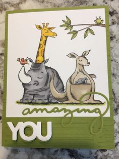 a card with an animal and giraffe on it