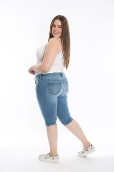 Hello Summer. Designed with you in mind, the super soft and ultra chic denim fabric now comes in a stylish capri. With a 18"" inseam, 10 1/8"" Rise, and 14 3/4"" Leg Opening complimented by a soft denim finish, The fray hem Pirate is perfect to pair with a relaxed tank or sneakers.Love your body. Fall in love with the New Pirate. Content: 52% Cotton 29% Rayon 17% Polyester 2% Spandex Knee-length Cropped Denim Jeans, Stretch Denim Knee-length Jeans, Stretch Knee-length Cropped Denim Jeans, Stretch Knee-length Summer Jeans, Summer Knee-length Stretch Jeans, Medium Wash Stretch Bottoms, Mid-thigh Length, Stretch Medium Wash Cropped Capri Jeans, Medium Wash Knee-length Denim Capris, Stretch Denim Knee-length Shorts