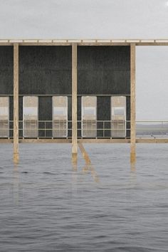 an empty building sitting in the middle of water