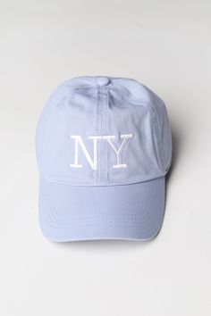 Get ready to elevate your everyday style with the NY Embroidered Baseball Cap. High-quality 3D embroidery and a unique pigment finish make this unisex accessory a standout addition to any outfit. Perfect for men and women, it's the perfect way to add a touch of personality to your look. Trendy Six-panel Baseball Cap With Embroidered Logo, Cotton Visor Baseball Cap With Letter Embroidery, Cotton Baseball Cap With Letter Embroidery, Trendy Blue Cotton Baseball Cap, Blue Cotton Snapback Hat With Embroidered Logo, Light Blue Baseball Cap For Spring, Trendy Blue Cotton Snapback Hat, Light Blue Spring Baseball Cap, Blue Cotton Baseball Cap With Embroidered Logo