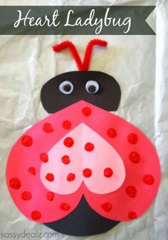 a ladybug craft made out of paper with the words heart ladybug on it