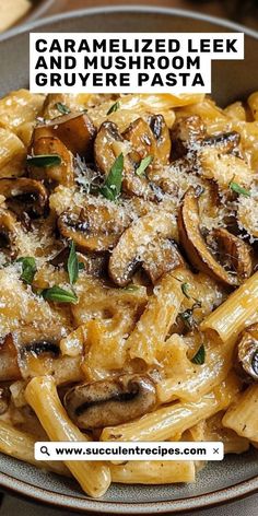 a pasta dish with mushrooms and parmesan cheese on top, served in a bowl