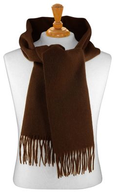 This is an elegant Biagio Collection 100% Wool Chocolate Brown Color Neck Scarf would make a wonderful addition to your wardrobe collection of scarves.  Its versatility allows it to be shaped and worn in various styles. Go from the modern tie around the neck or anything your imagination can come up with.  Dimensions are 12.5" x 65" inches.  This makes an excellent gift for men or women for any occasion.  The material is 100% wool - not mixed with any other material.  The neck scarve is great for Neck Scarfs, Chocolate Brown Color, Chocolate Brown Colour, Indigo Colour, Burnt Orange Color, Oversize Knit, Fuchsia Color, Neck Scarf