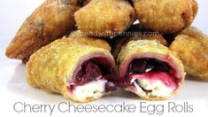 cherry cheesecake egg rolls are stacked on top of each other