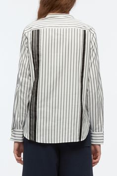 White Signature Stripes Shirt For Work, Elegant Shirt With Vertical Stripes For Daywear, White Tops With Signature Stripes For Workwear, White Vertical Stripes Blouse For Workwear, Pinstripe Shirt With Contrast Stripes For Work, White Vertical Striped Tops For Office, White Blouse With Vertical Stripes For Work, Elegant White Blouse With Vertical Stripes, Pinstripe Tops With Striped Cuffs For Work