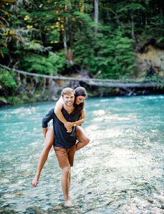 two people are standing in the water together