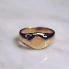 Gold toned brass Small Minimalist Ring in sizes for both men and women. This simple ring has a circular flat face but lot's of style and flat top rings are definitely in right now! Available in 925 Sterling Silver https://etsy.me/2sLAcwj Available in Larger Style https://etsy.me/2CEYcpw Ring Size Available in all sizes. Please be sure to find your exact ring size for the finger you want before ordering. See image chart above or you can use the chart on my website as a guide - https://jewelrylab. Gold Brass Signet Ring For Everyday, Classic Everyday Brass Signet Ring, Everyday Brass Rings With Polished Finish, Everyday Brass Rings, Everyday Brass Signet Ring, Minimalist Gold Brass Rings, Minimalist Gold Brass Signet Ring, Minimalist Gold Signet Ring In Brass, Minimalist Brass Rings For Formal Occasions