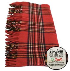 a red and black plaid scarf with fringes