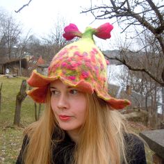 Beautiful bell shaped hat with pink and purple flowers. Unique hat in which you will feel amazingly good. It is from natural material and created with love. Warmth, coziness, pleasure and festive feeling will embrace you. Good mood is guaranteed. A good gift for a good person. This hat is made of 100% wool using wet felting technique. Its made by my hands in my small home studio. Materials: New Zealand sheep wool 100% Hats can be ordered in any colors and sizes. If you want the hat just like in Whimsical Flower Costume Hats For Party, Whimsical Adjustable Hat For Carnival, Whimsical Adjustable Hats For Carnival, Whimsical Hats For Birthday Carnival, Whimsical Hats For Birthday And Carnival, Playful Multicolor Costume Hats, Whimsical Wide Brim Winter Hat, Playful Wide Brim Hat For Festivals, Whimsical Party Hats