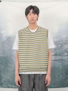 Editor's NoteFANACULT's knit vest is suitable to wear during summer season with high air permeability. With a soft texture and tone-on-tone color, it is easy to wear in your daily life. It has an oversized silhouette suitable to wear for both male and female, and has a casual and comfortable mood. You can layer it with other products and wear it during all seasons for the casual streetwear style.  - V-shape neckline- High air permeability- Tone-on-tone color mixMeasurements (in.)M/L- S Casual Sweater Vest For Layering, Casual Green Vest For Layering, Casual Sweater Vest For Layering In Spring, Spring Green Knit Vest, Casual Green Knit Vest, Casual Beige Sweater Vest, Casual Sleeveless Sweater Vest With Relaxed Fit, Casual Relaxed Fit Sleeveless Sweater Vest, Casual Relaxed Fit Spring Vest