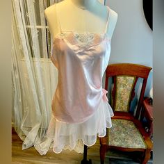 Vintage Mini Nightgown Size Medium. Matching Bikini Cut Panties Are Nwot. Petal Pink Satiny Slip With A Wide Chiffon Ruffled Hem. Ruched On The Side And Gathered With A Bow. Embroidered Neckline, Spaghetti Straps. Sheer Sleeveless Nightgown For Pajama Party, Fitted Feminine Sleepwear For Night, Feminine Fitted Nightgown For Pajama Party, Pink Camisole Sleepwear For Wedding Night, Sheer Camisole Sleepwear For Sleepover, Flirty Camisole Sleepwear For Sleepovers, Coquette Camisole Sleepwear For Sleepover, Coquette Sleepwear For Wedding Night In Summer, Sheer Sleeveless Sleepwear For Pajama Party