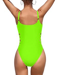 Neon green one-piece swimsuit with adjustable straps, removable padded bra, low neckline, and sexy lace-up side detailing, made of high-quality stretchy and comfortable fabric, perfect for swimming and beach parties.Features: Swimwear Type: one piece swimsuits Style: slimming, modest, trendy bathing suits Fabric: 85% polyester, 15% spandex Top Type: push up Closure: lace up closure Neckline: scoop neck swimwear Strap Type: adjustable straps Back Style: u-back Chest Pad: padded Color: neon green Neon Green Swimsuit, Trendy Bathing Suits, Green One Piece Swimsuit, Green One Piece, Purple Mermaid, Beach Parties, Spandex Top, Green Swimsuit, Low Neckline