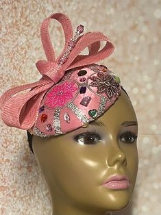 This pink satin fascinator speaks volumes in style. The hat is trimmed with a rhinestones, bows, and a hat pin. The hat pin may vary and is for decorative purposes only. Make a statement with this gorgeous piece! Perfect for church, bridal party, mother of the bride, tea party, cocktails or any other special event. The hat measures approximately 6 inches in diameter. The hat is affixed to the head by a hat elastic/string. Handmade Gifts for mom, sister, wife, or yourself. SHIPPING All items for Kentucky Derby Party Hat With Satin Bow, Adjustable Party Fascinator With Satin Bow, Spring Party Fascinator With Satin Bow, Spring Party Hair Accessories With Satin Bow, Adjustable Ribbon Headpieces For Parties, Adjustable Satin Bow Headpiece For Party, Party Fascinator With Ribbon, Adjustable Bow Fascinator For Party, Party Satin Bow Headband