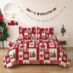 a red and white bed with christmas decorations on it