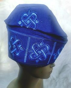 "Celebrant Champagne Gold Embelished with Blue Stones New Design Aso Oke African Nigerian Men Fila Cap The more quality, the bigger the discount. Design may vary to the one in the image, we use design in vogue at the time of production.  Please note it comes in size 23\" or 23 1/2\". If you need any order size please let us know and we can do custom made size for you(price varies).      Available as aso ebi, you can customise to any other colors and design, just send us a message and we can proc Traditional Fitted Blue Hat, Traditional Blue Cap, Traditional Blue Embroidered Hat, Coral Navy, Aso Oke, Man Hat, Prom Outfits, African Print Fabric, Africa Fashion