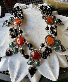 Stunning Bold Beautiful Sterling Silver Carnelian Green and Black Onyx Vintage Bib Festoon Necklace This necklace is absolutley stunning , Not for the faint at heart Measures aprox 16 inches around , necklace has a 2 inches chain extension Each pendant measures over 3 inches See matching earrings in link below https://www.etsy.com/listing/744424320/f?ref=shop_home_active_1&frs=1 Unique Black Gemstone Necklaces, Unique Black Gemstone Necklace, Black Bohemian Beaded Gemstone Necklace, Artisan Black Onyx Necklace, Vintage Onyx Gemstone Jewelry, Bohemian Onyx Gemstone Necklace, Vintage Black Jewelry With Natural Stones, Handmade Black Bohemian Beads, Gems And Cabochons, Artisan Black Cabochon Jewelry