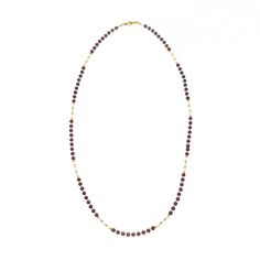 This necklace features 81 primary gemstones made of garnet, as well as spacer gemstones made of fresh water pearls and faceted zircon. The number 9 is considered significant in ancient Chinese culture, and the necklace's design incorporates this belief with its 81 gemstones. The necklace can be worn as a traditional necklace or as a glasses chain. The pendant features a white jade gemstone with a filigree design and faceted zircon tassel. The pendant can be detached from the necklace and replace Traditional Necklace, Asian Jewelry, Jade Gemstone, Number 9, Garnet Necklace, Fresh Water Pearls, White Jade, Filigree Design, Glasses Chain